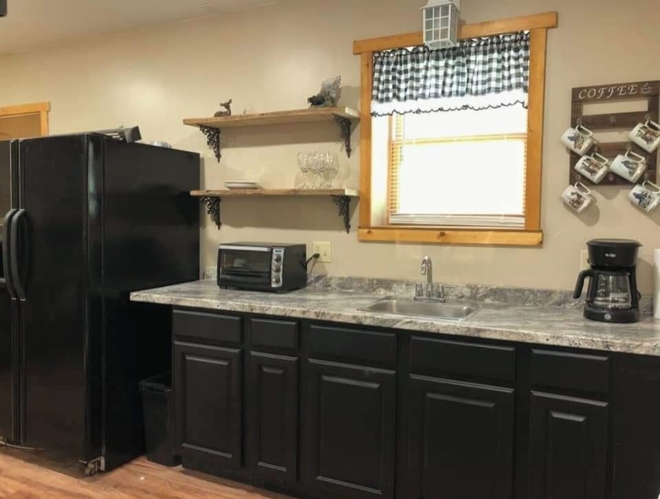 Another view of downstairs wet bar/kitchenette
