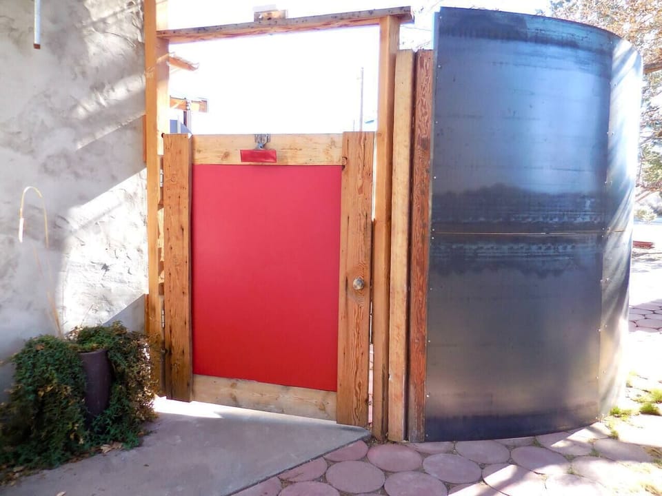 Private locking gated entrance to the suite, just steps from the off-street parking area.