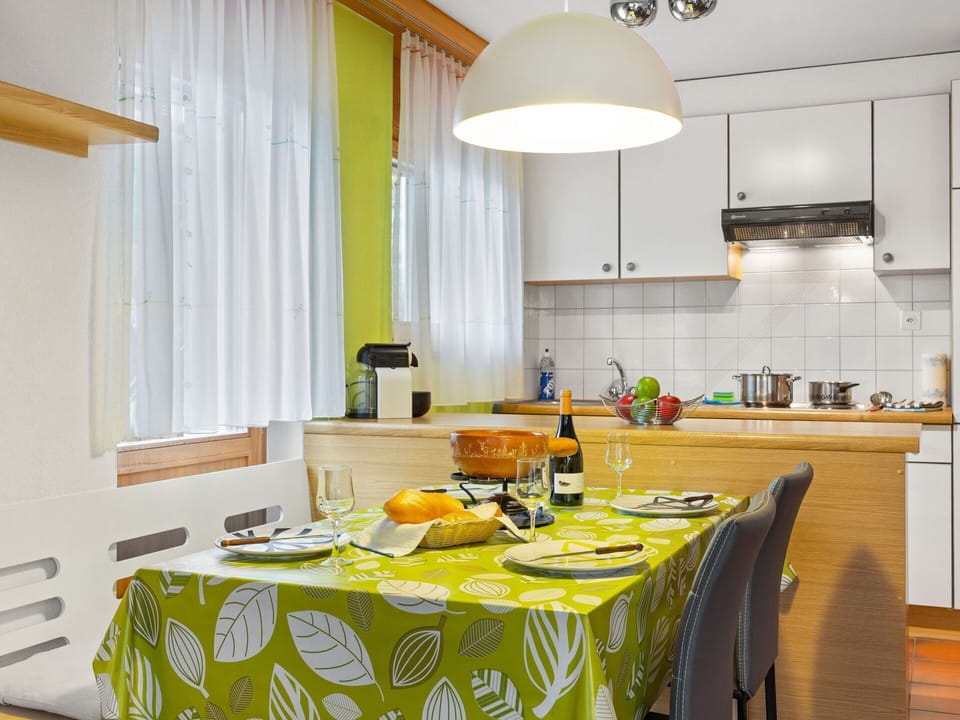 Property, Cabinetry, Furniture, Table, Countertop, Interior Design, Lighting, Orange, Wood, Kitchen