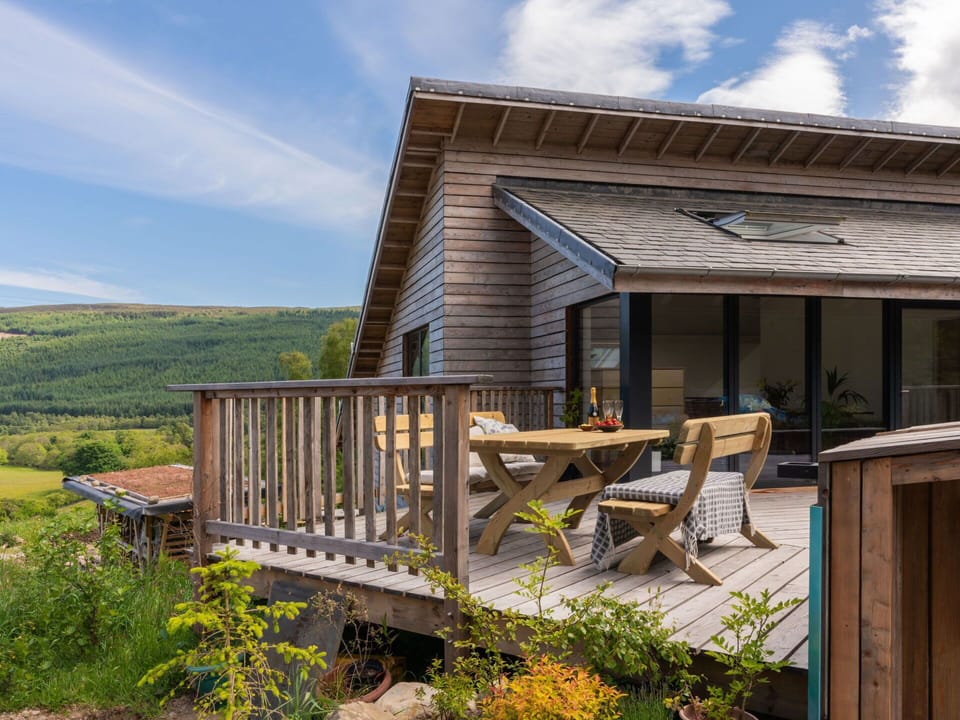 Cloud, Sky, Plant, Property, Wood, Building, Flower, Table, Outdoor Furniture, Land Lot