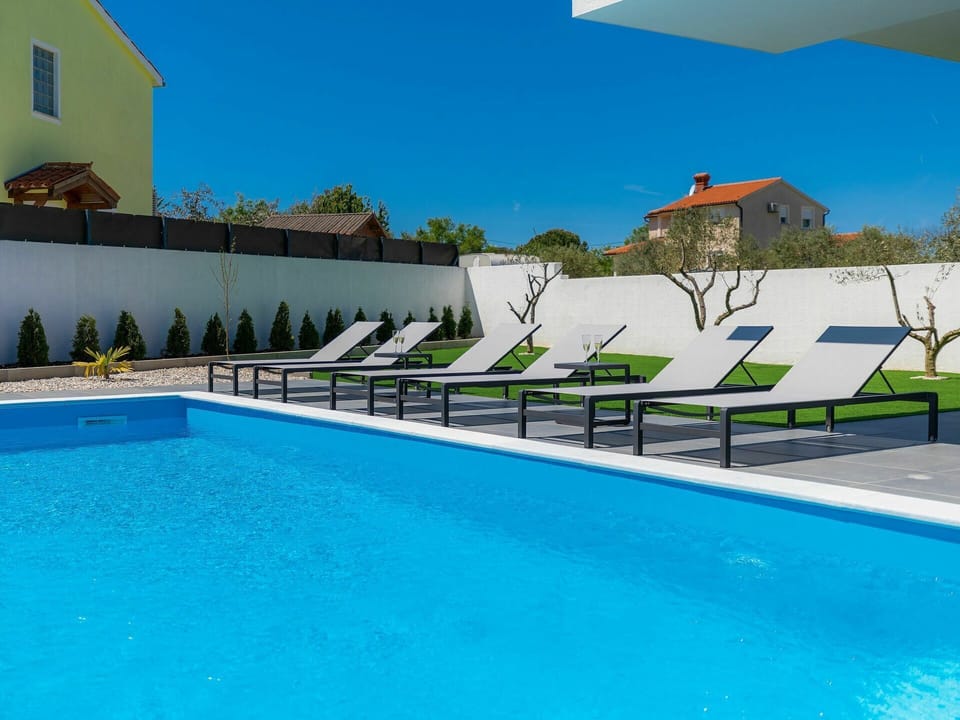 Water, Sky, Plant, Property, Building, Swimming Pool, Blue, Azure, Shade, Outdoor Furniture