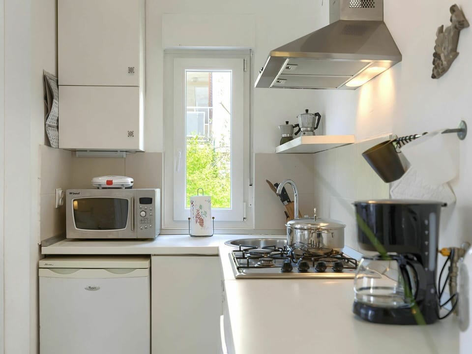 Kitchen Sink, Property, Countertop, Cabinetry, White, Kitchen Appliance, Kitchen Stove, Kitchen, Gas Stove, Sink