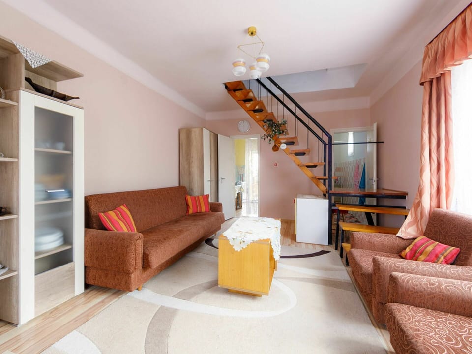 Furniture, Couch, Comfort, Interior Design, Orange, Wood, Building, Shelf, Window, Table