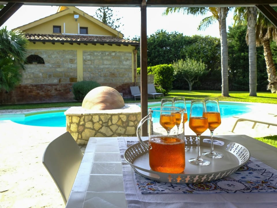 Tableware, Property, Plant, Water, Table, Food, Chair, Outdoor Furniture, Building, Interior Design