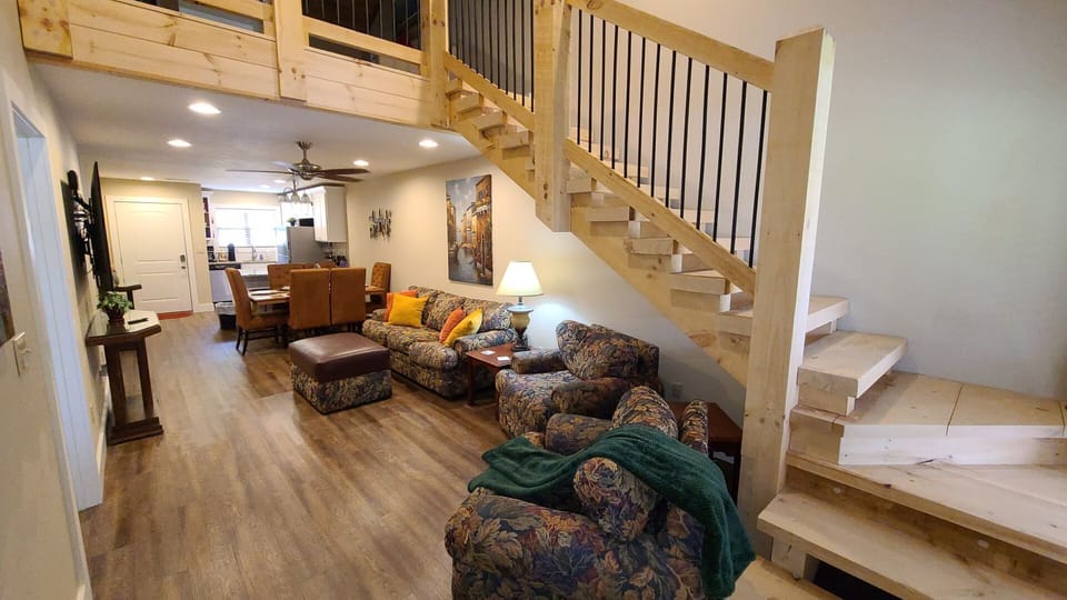 View of Living Room, and Stairs to Loft Area