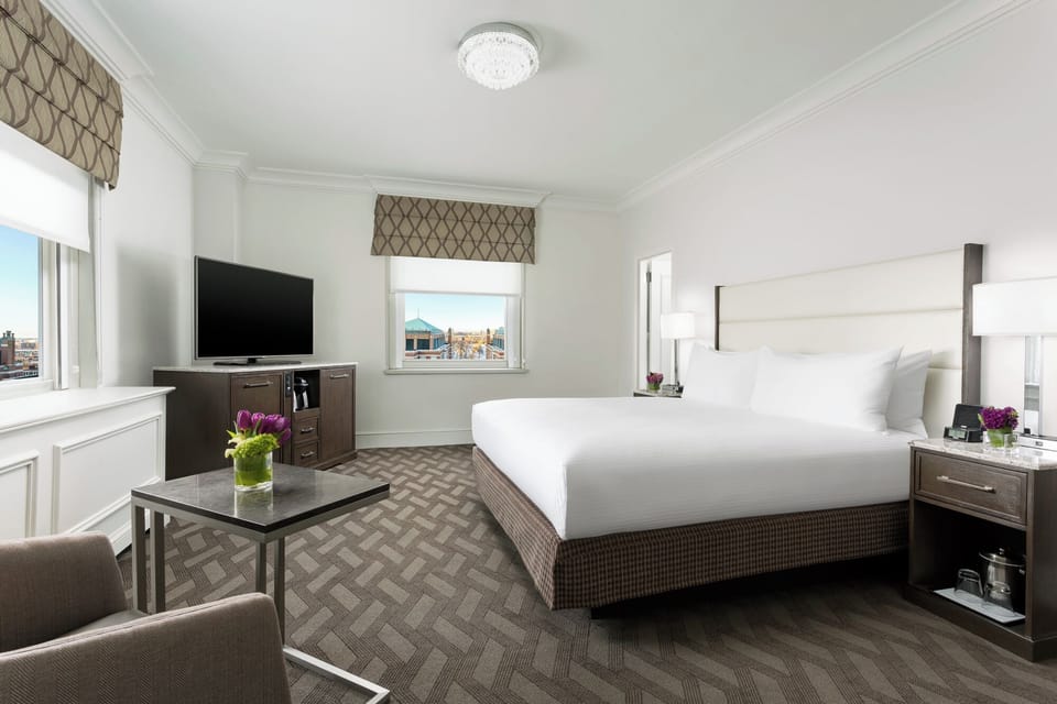 Stretch out on a plush king bed in airy serenity.