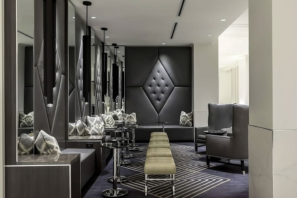 Sink into a private lounge nook with soft ambient lighting.