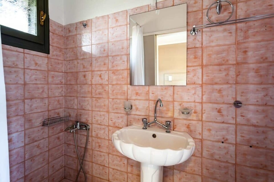 Refresh yourself in the modern, spacious bathroom.
