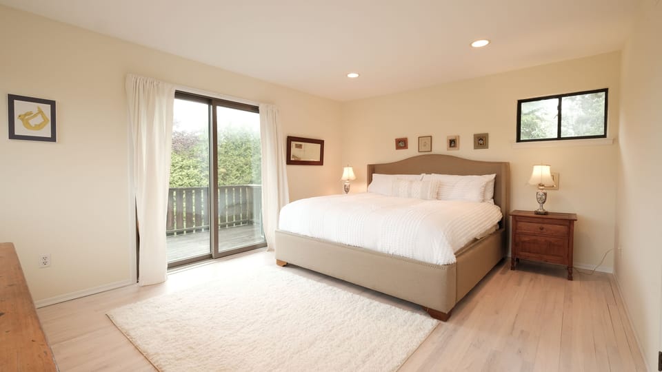 King Bedroom with balcony overlooking pool