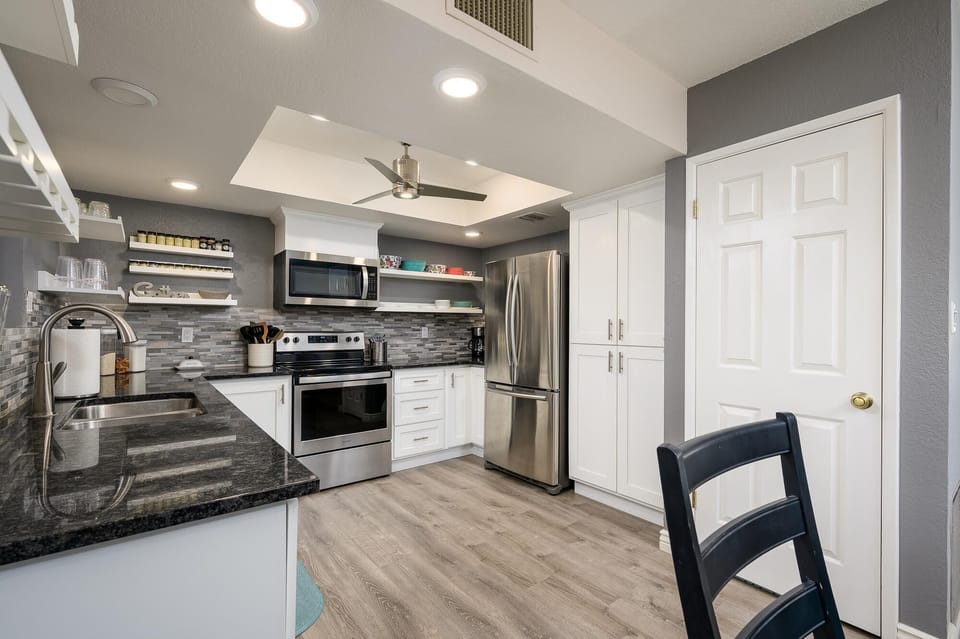 Modern kitchen with stainless steel appliances
