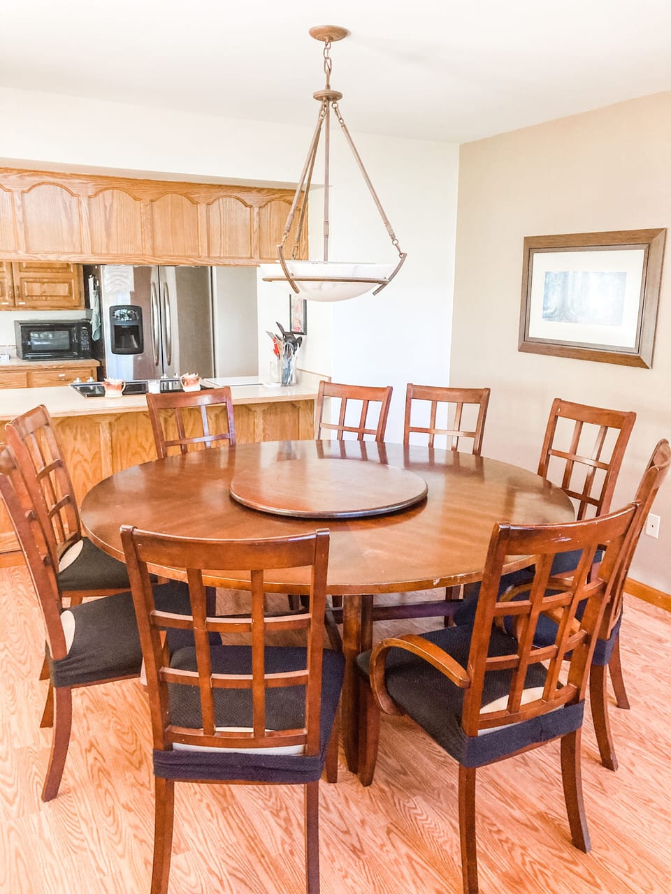 Table seats nine. Two living room benches fold into tables and seat four each. 