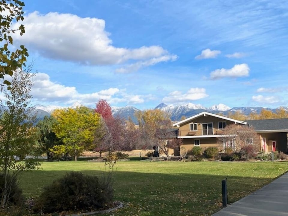 View of property/main house...guest cottage is located to the right- on river