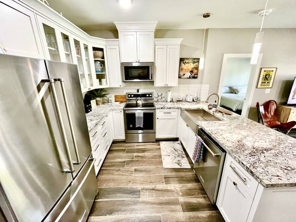 Unit 101 Fully stocked gourmet kitchen with Clint Eastwood making sure!