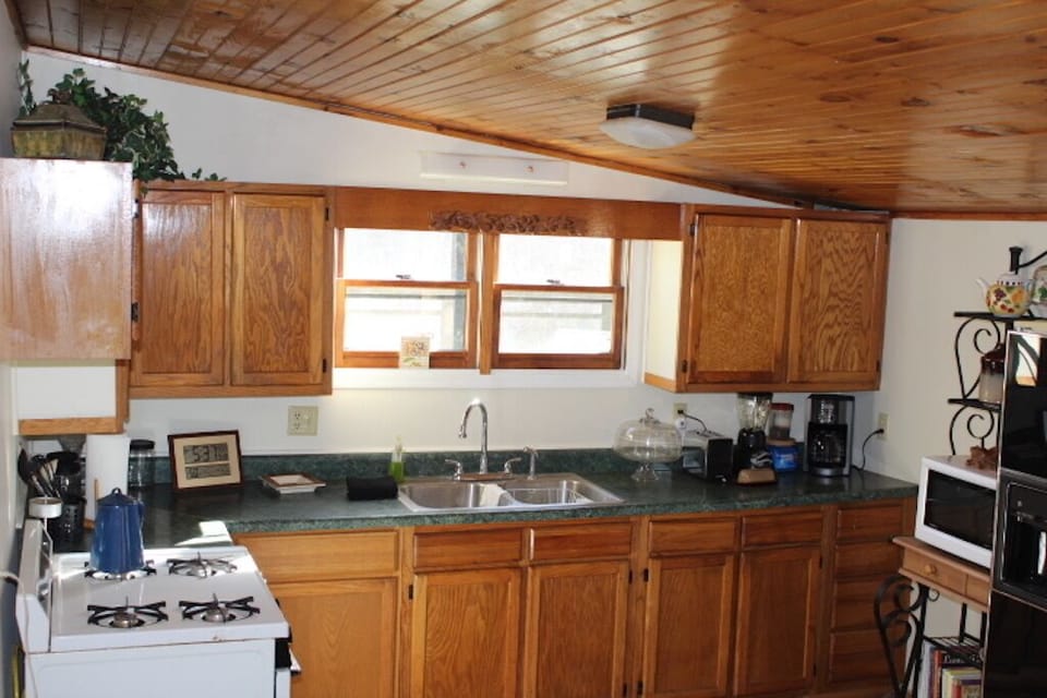 Bright, fully equipped kitchen for all your cooking needs. 
