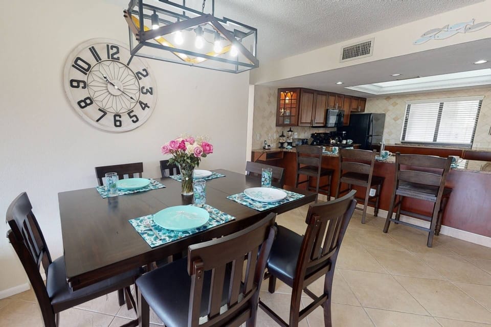 Plenty of space to enjoy meal time as a family.  Dining table for 6 and kitchen bar seating for 3 plus seating out on the balcony.