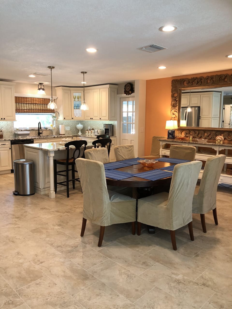 Open kitchen and dining space can seat 11 people