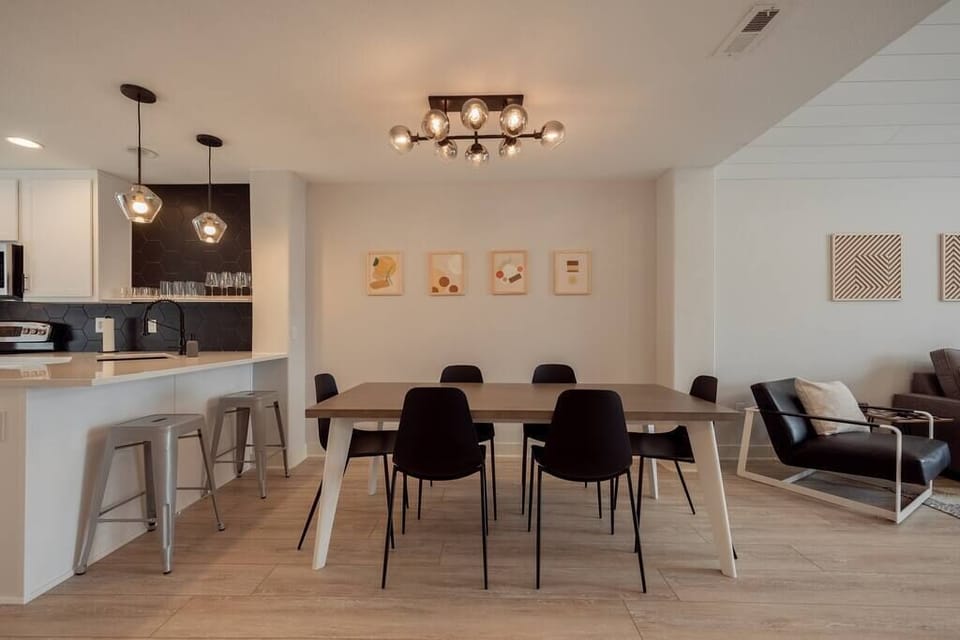 The open plan living/dining/kitchen flows seamlessly creating a bright and inviting space