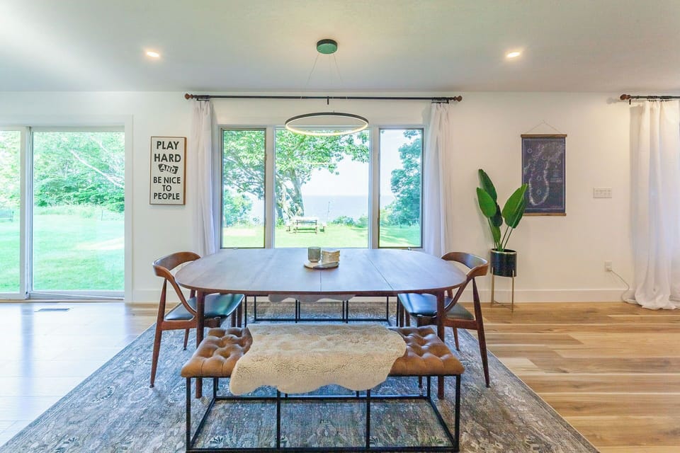 Large open dining/living to gather for dinners, games and puzzles!