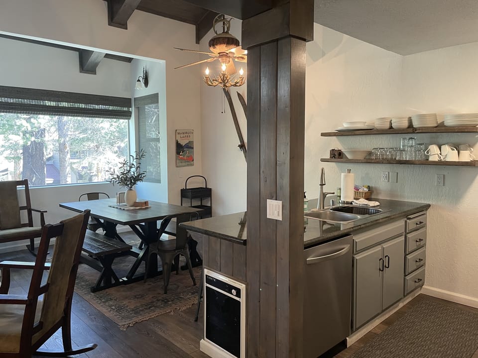 Dining table and seats at the counter as well. 