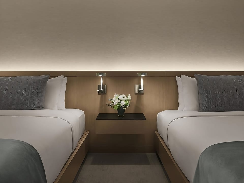 Drift off with soothing bedside lighting and hotel-soft pillows.