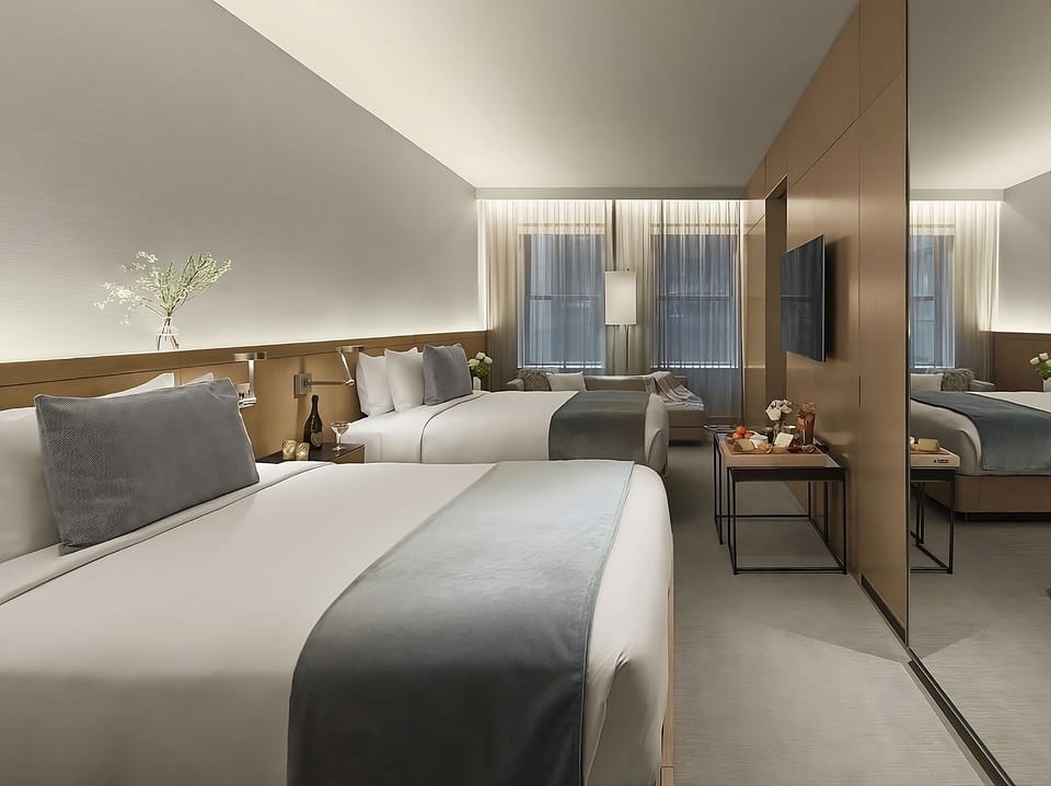 Enjoy extra space with mirrored closets and serene neutral tones.