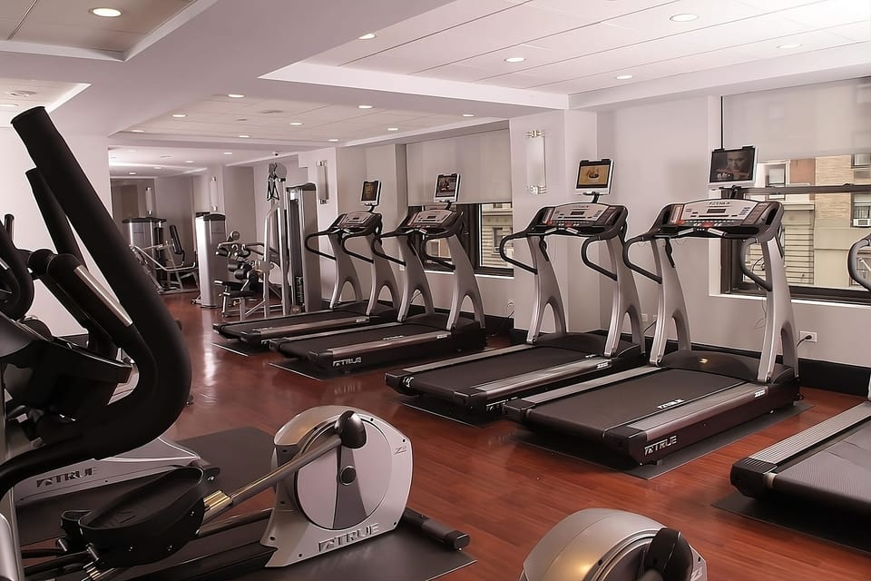 Recharge with bright cardio workouts on modern treadmills.
