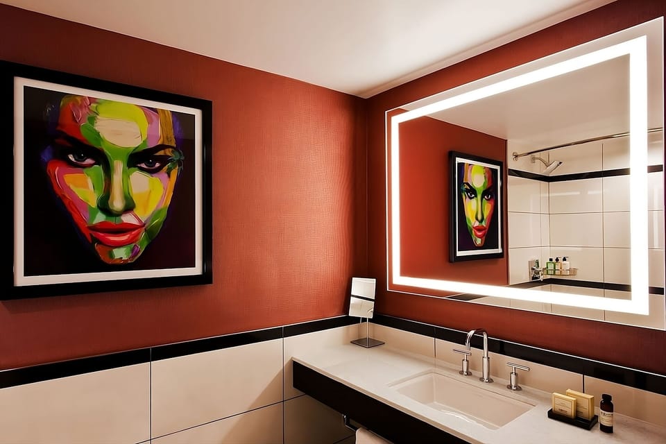 Start your evening with a glowing mirror and modern vanity.