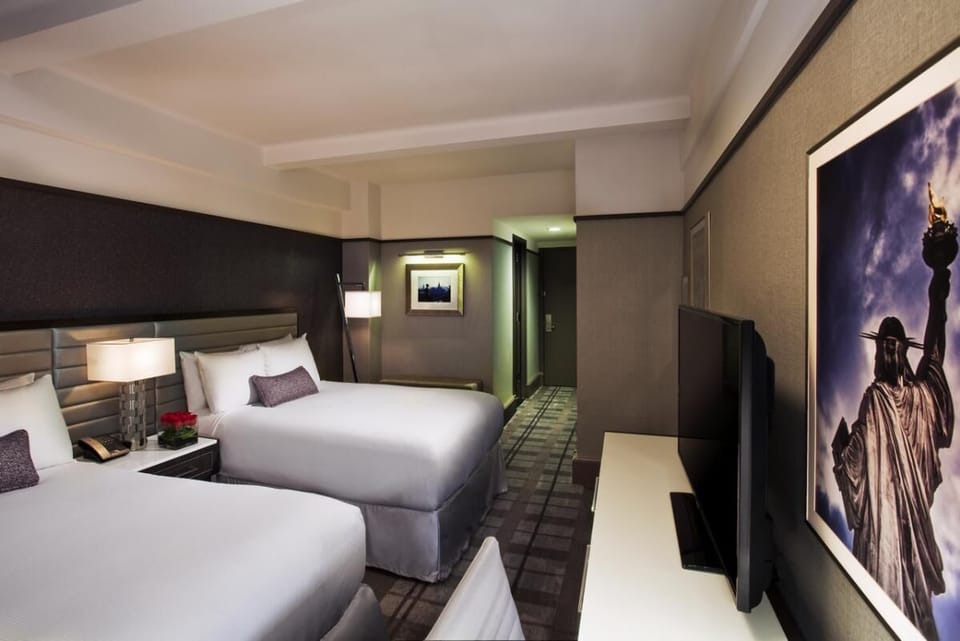 Relax after a busy day with soft lighting and plush beds.