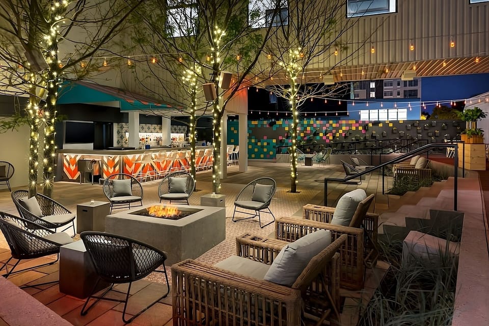 Gather by the fire pit for cozy evening cocktails.