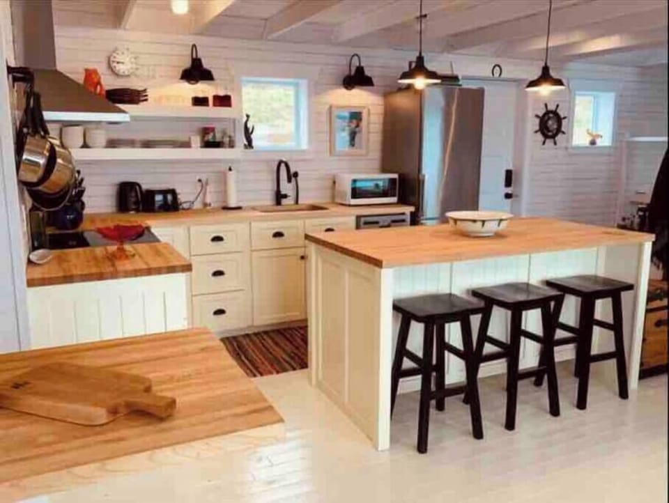 Beautiful custom kitchen outfitted with all the essentials.