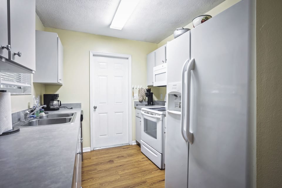 kitchen with door to porch and garage
