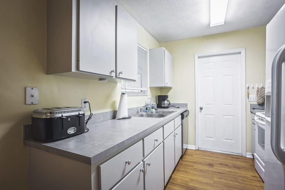 kitchen viewing toaster coffee maker and sink