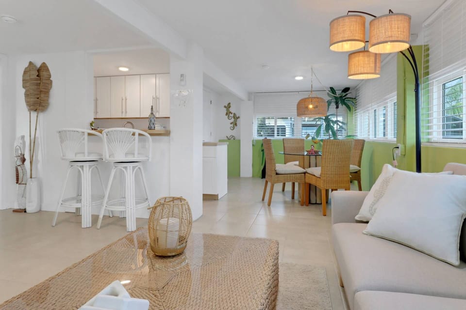 The open living space is bright, comfortably furnished, and provides a wonderful, cozy, beach getaway!