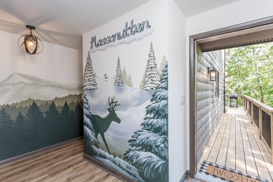 Enjoy views of the ski slopes from the spacious wrap-around porch and observe wildlife from the back deck featuring a hot tub