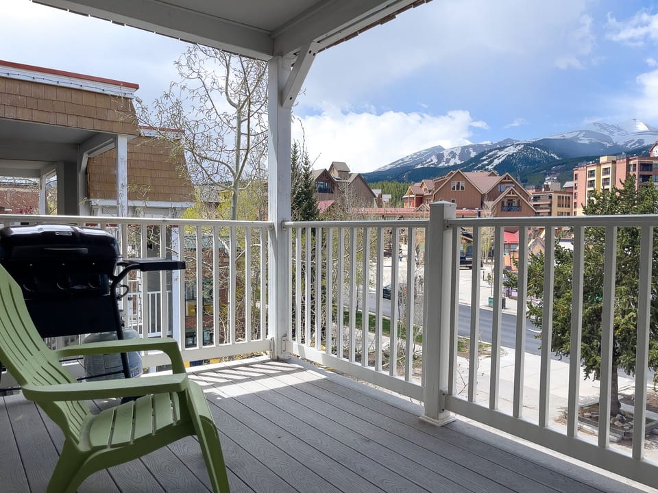 Large patio with a grill.