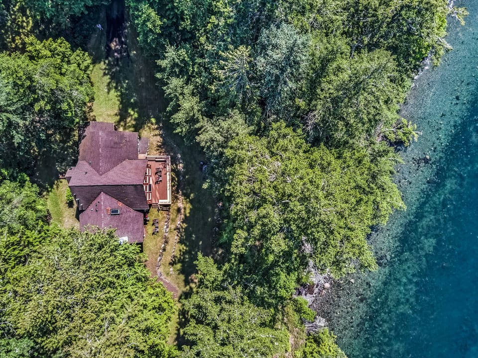 Waterfront home (deep water dock access, no beach access, high bank waterfront)
