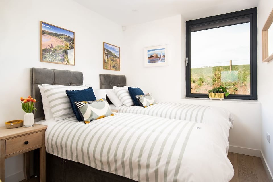 6 The Bay, Coldingham - bedroom two has views of rolling countryside to the rear of the apartment