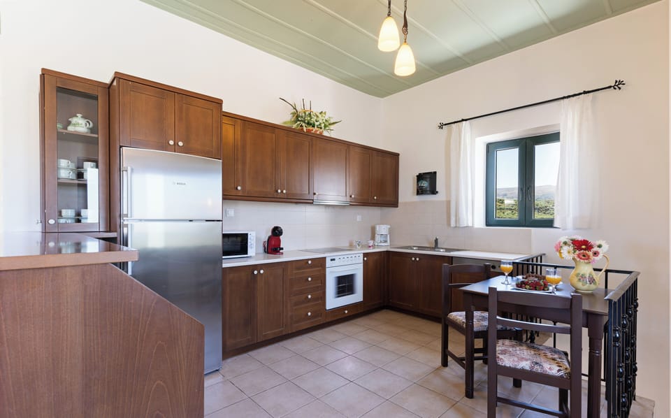 The open plan kitchen-dining area.