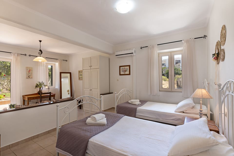 Triple Ground Floor Bedroom with direct access to the pool.