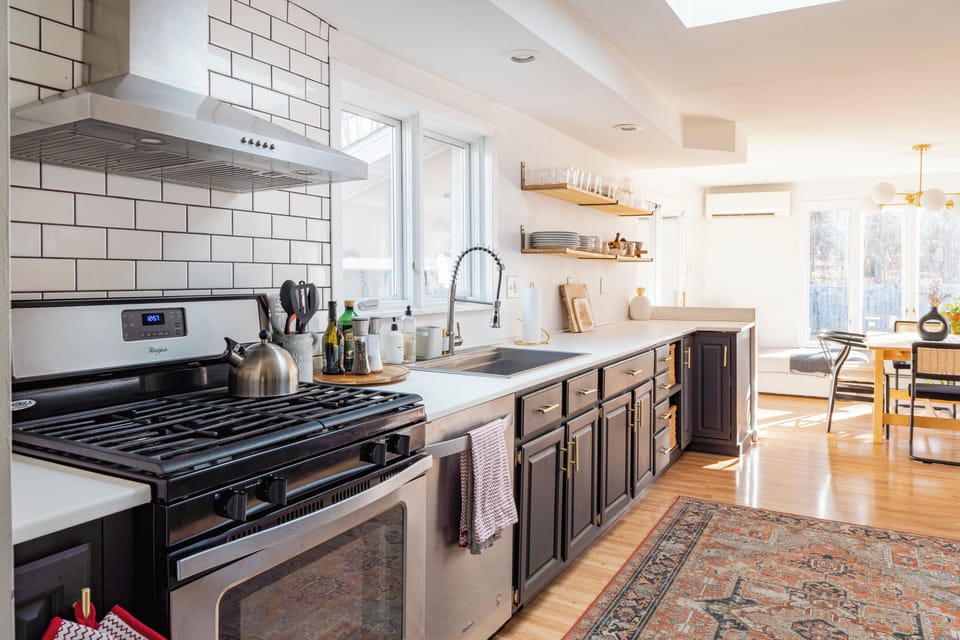 Modern kitchen with sleek finishes and natural light 