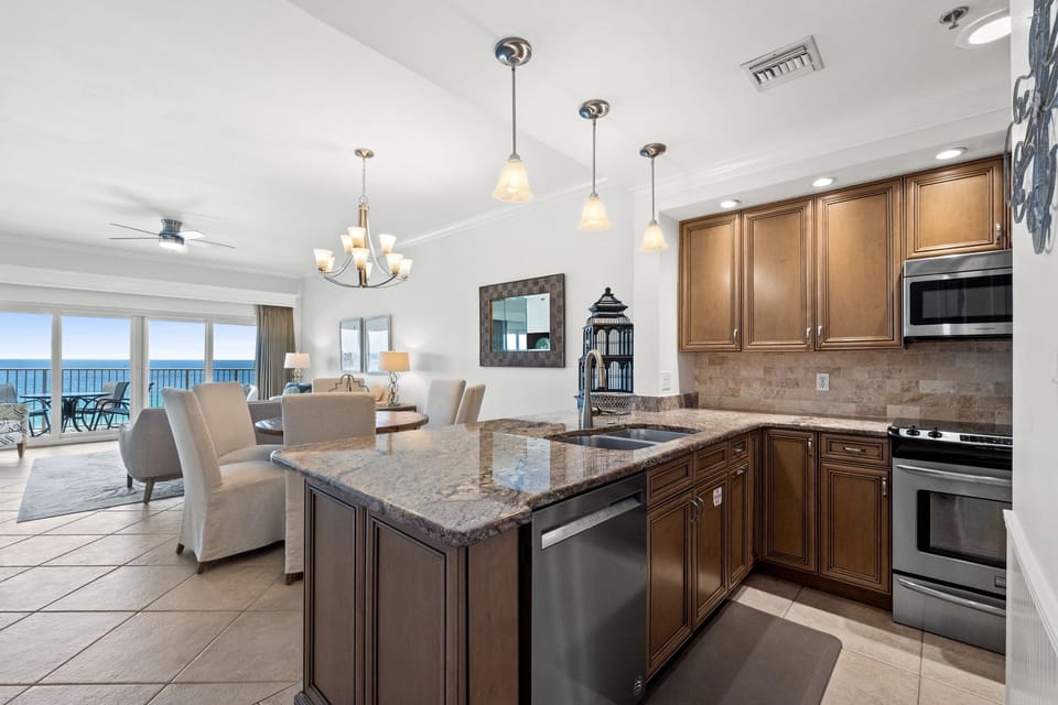 Modern kitchen stocked with essentials and open sightlines.

Professionally Managed by
Breathe Easy Rentals