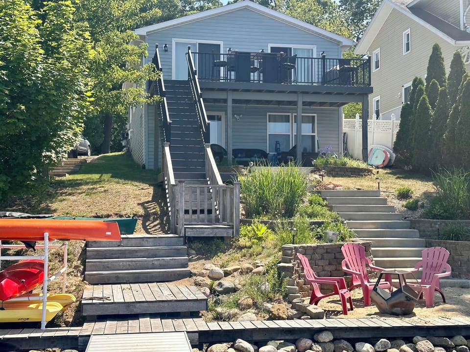 View of the back of the cottage from the water/dock. 