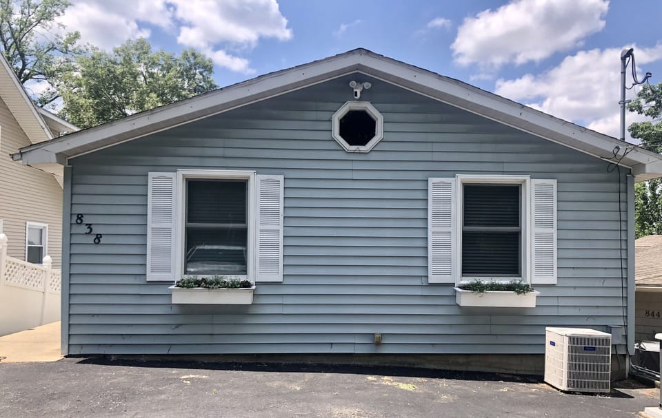 Cottage from the street view. Parking for 2 cars directly in front. 