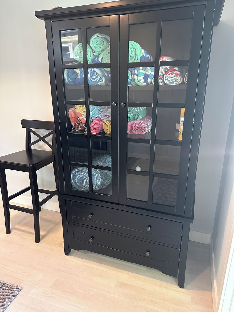 Cabinet with Beach Towels and Blankets located on lower level. 
