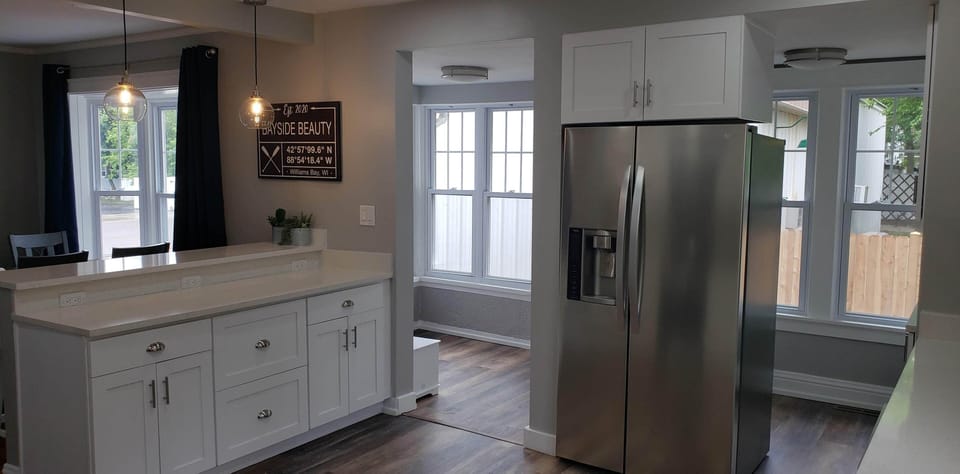 Kitchen opens to the dining area.
