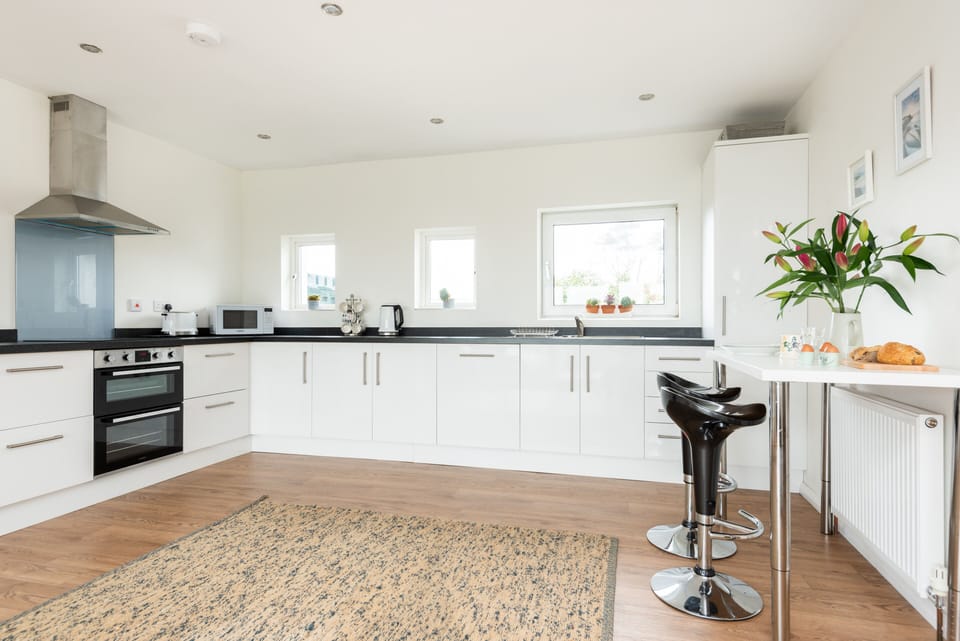 Spacious kitchen with a breakfast bar area 