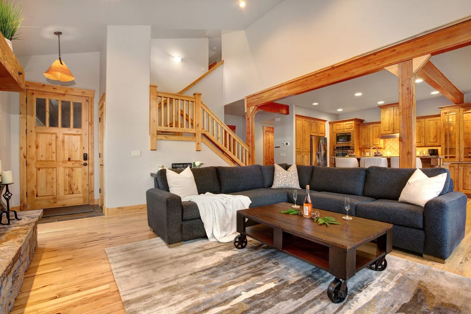 Enter Main Level Great Room with High Ceiling and Hardwood Floors