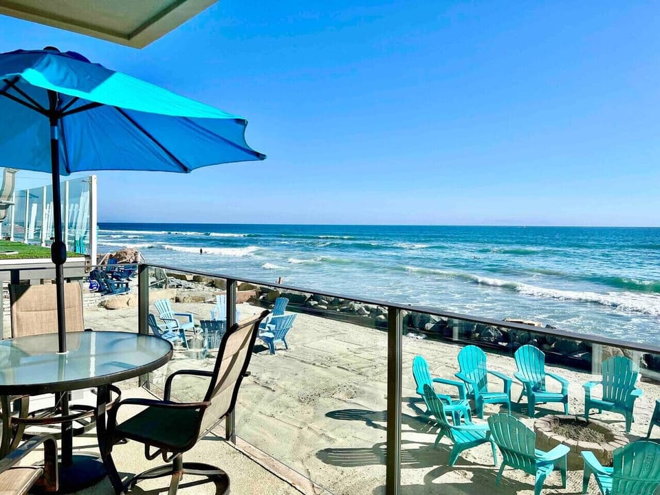 Oceanfront rental in Oceanside California, Beachfront vacation rental, Oceanside beach house, Direct beach access nearby, Private sandy backyard, Fire pit on the beach, No street between house and ocean, Walk to Oceanside Pier, Walk to restaurants and cof