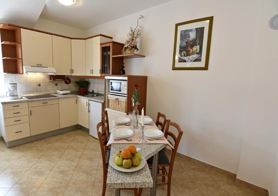 The fitted kitchen and adjoining dining area.