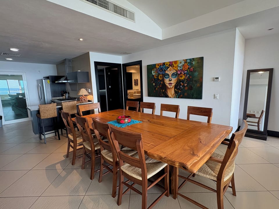 Dining table area, Kitchen and bedroom entrance